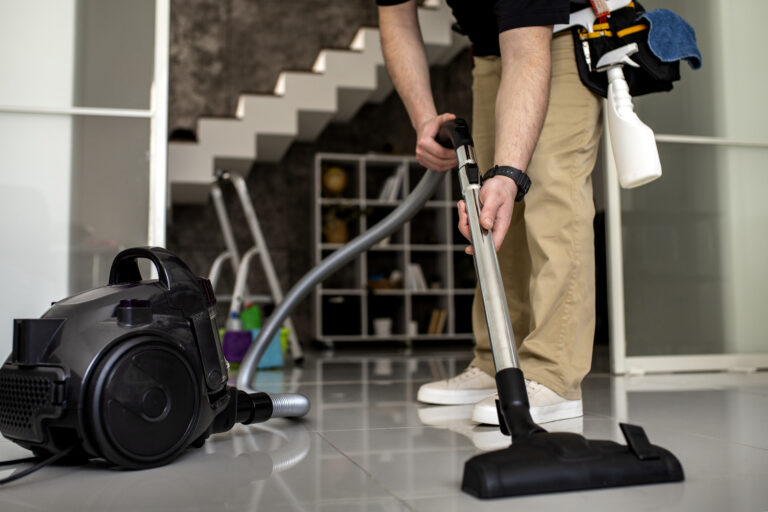 man doing professional home cleaning service