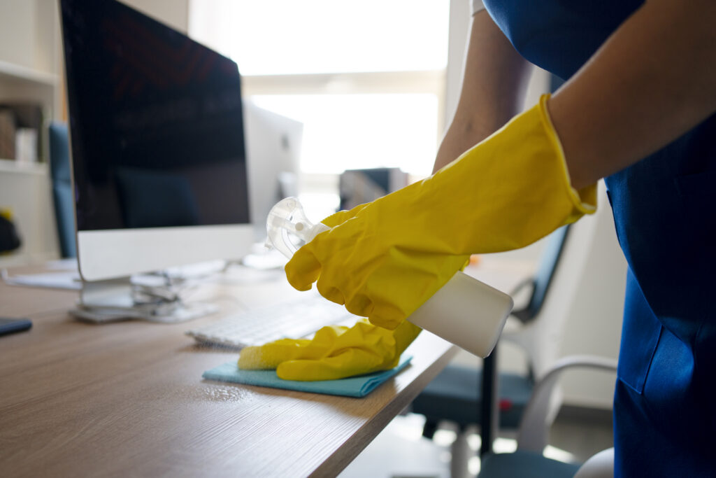 professional cleaning service person cleaning office
